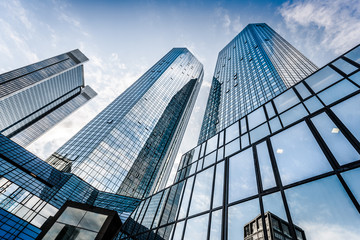 Fototapeta na wymiar Modern skyscrapers in business district with blue sky