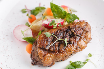 Roast duck breast with vegetables