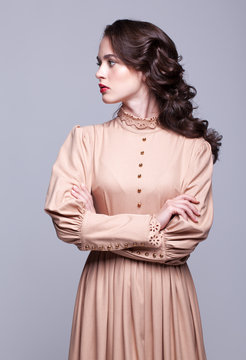 Portrait Of Young Woman In Retro Dress