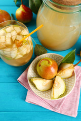 Fresh pear juice with fruit on table close up