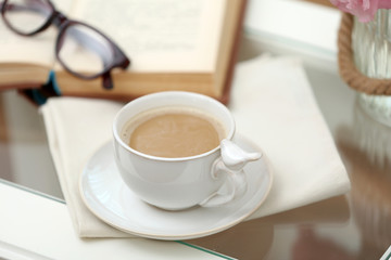 Obraz na płótnie Canvas Cup of coffee on table close up