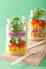 healthy vegetable chickpea salad in mason jar