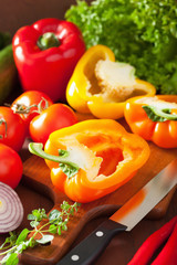 chopping healthy vegetables pepper tomato salad onion chili on r
