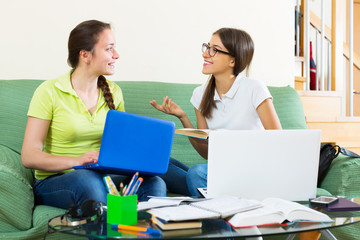 Student girls studying at home