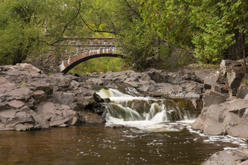 Fototapeta na wymiar Amity Creek Falls & Stone Arch Bridge