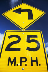 Yellow street sign saying 25 Miles Per House, 04.26.2014