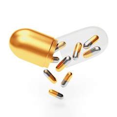Medical golden and silver capsules falling from a large transparent capsule isolated on white background. 