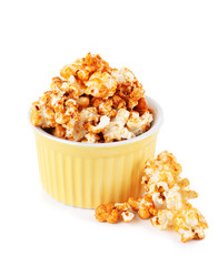 Sweet caramel popcorn isolated on white background