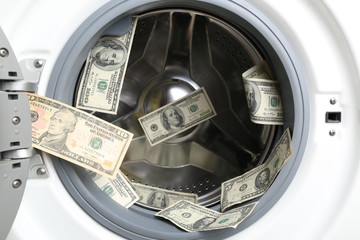 Money in washing machine, close up