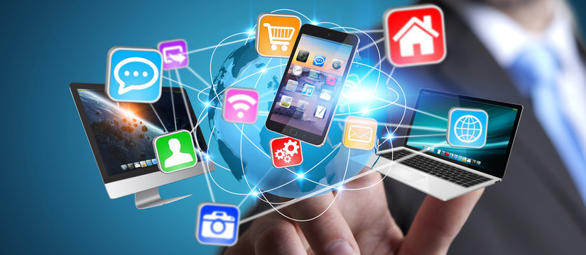 Businessman connecting tech devices