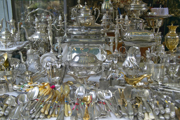 Silverware and silver items for sale at Flea Market, Paris, France