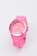 wrist watch pink on white background