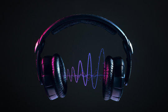 Headphones and disco waves isolated on black background