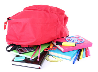 Red bag with school equipment isolated on white