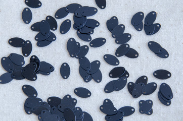 Black oval sequins