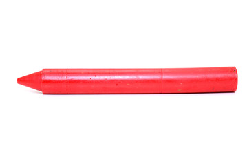 Red crayon on white background.