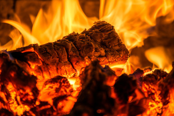 Firewood beautifully lit in the fireplace


