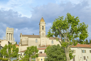 Fototapeta na wymiar Town of La Turbie with Trophee des Alpes and church, France