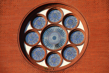 Minsk, Belarus - JUNE 30, 2015: the Church of St Simon and Helen (Red Church) and an independence square - the main square of Minsk and the city centre.
