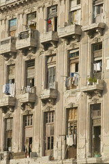 Dilapidated balconies with laundry hanging out to dry in Havana, Cuba