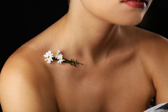 View on woman's neck, collarbone and shoulders, close-up
