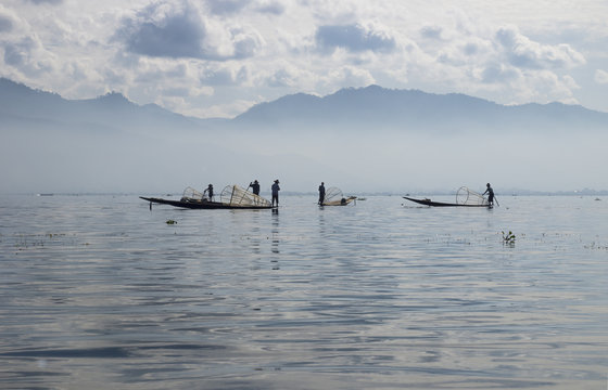 Inle lake fishers in the misty early morning, Myanmar