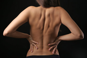 View on woman's nude back, close-up