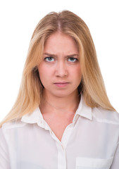 Closeup portrait of sad and depressed woman isolated on white