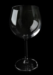 Empty glass on black background