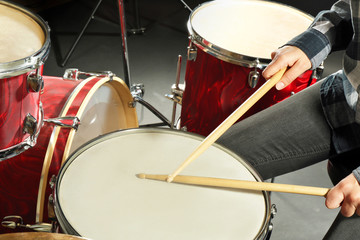 Fototapeta na wymiar Drummer playing the drums closeup