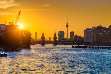 Naklejka premium Berlin skyline with Spree river at sunset, Germany