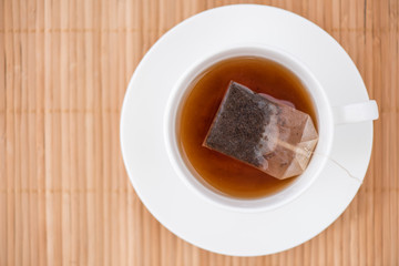 Hot Tea on Bamboo Mat