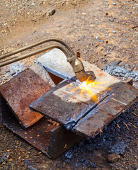 Metal cutting with acetylene torch