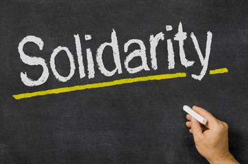 Solidarity written on a blackboard