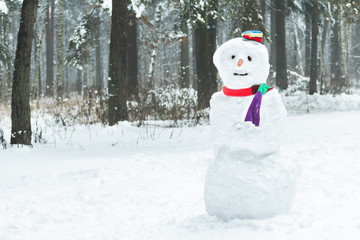 Holiday winter three snowball snowman with hat and scarf