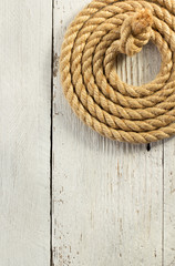 Fototapeta na wymiar ship rope on wood