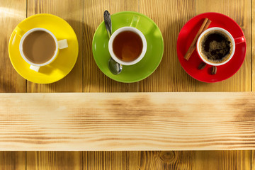 cup of coffee and tea on wood