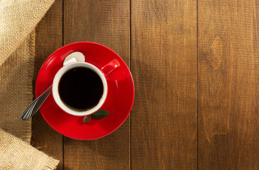 cup of  coffee on wood