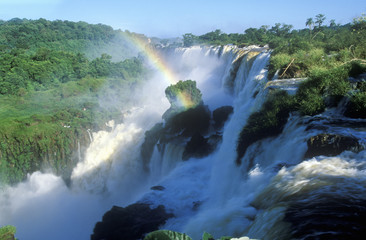Rainbow over Iguazu Waterfalls in Parque Nacional Iguazu viewed from Upper Circuit, border of Brazil and Argentina