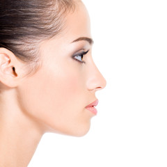 Naklejka premium Profile face of a young woman