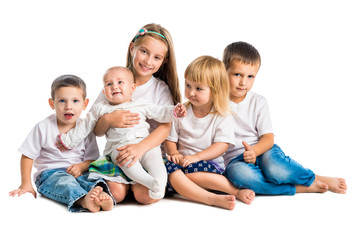 Fototapeta na wymiar children in white shirts smiling