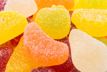 Fruit jelly candies closeup background