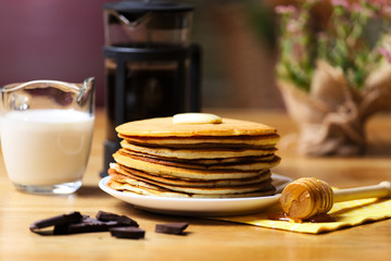 Crepes with chocolate and milk