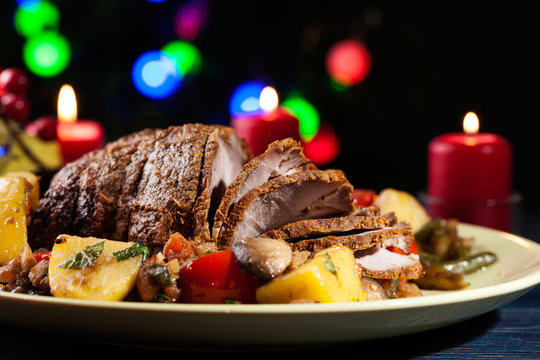 Juicy roast pork on the holiday table