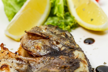 Grilled sea bass closeup.