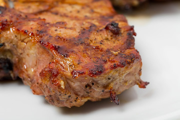 Grilled steaks with vegetables.