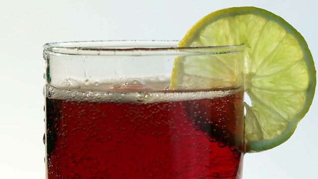 Red Carbonated Drink Poured Into Glass Lemon
