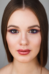Fototapeta premium Beauty portrait of attractive woman with bright makeup