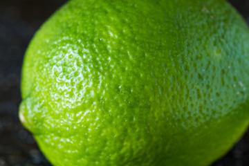 Lime on a black marble desk