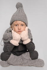 cute baby boy in warm woolen clothes